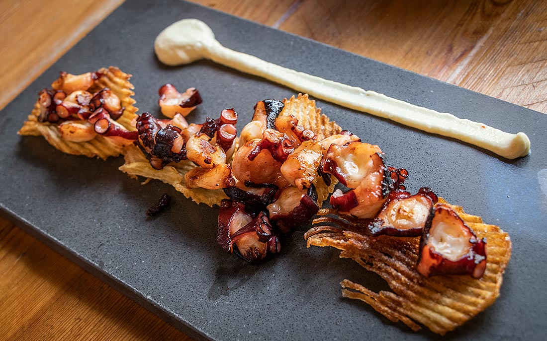 Eat free tapas in modern versions at Nuestra Tierra in Almería's tapas street.