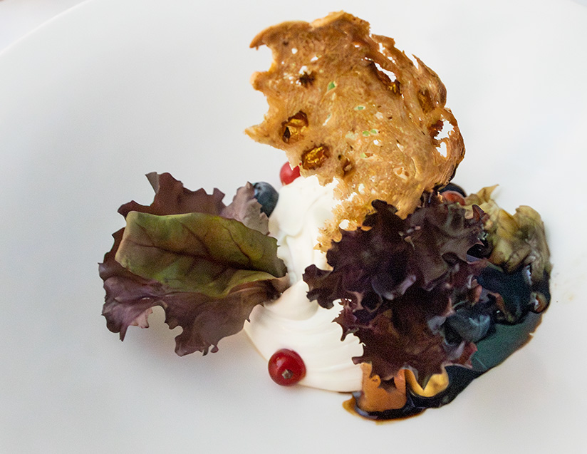 Enjoy a delicious dinner with river views at Abades Triana in Seville.