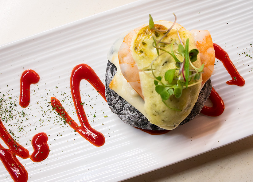 Enjoy modern tapas at Flores Gourmet in Seville.